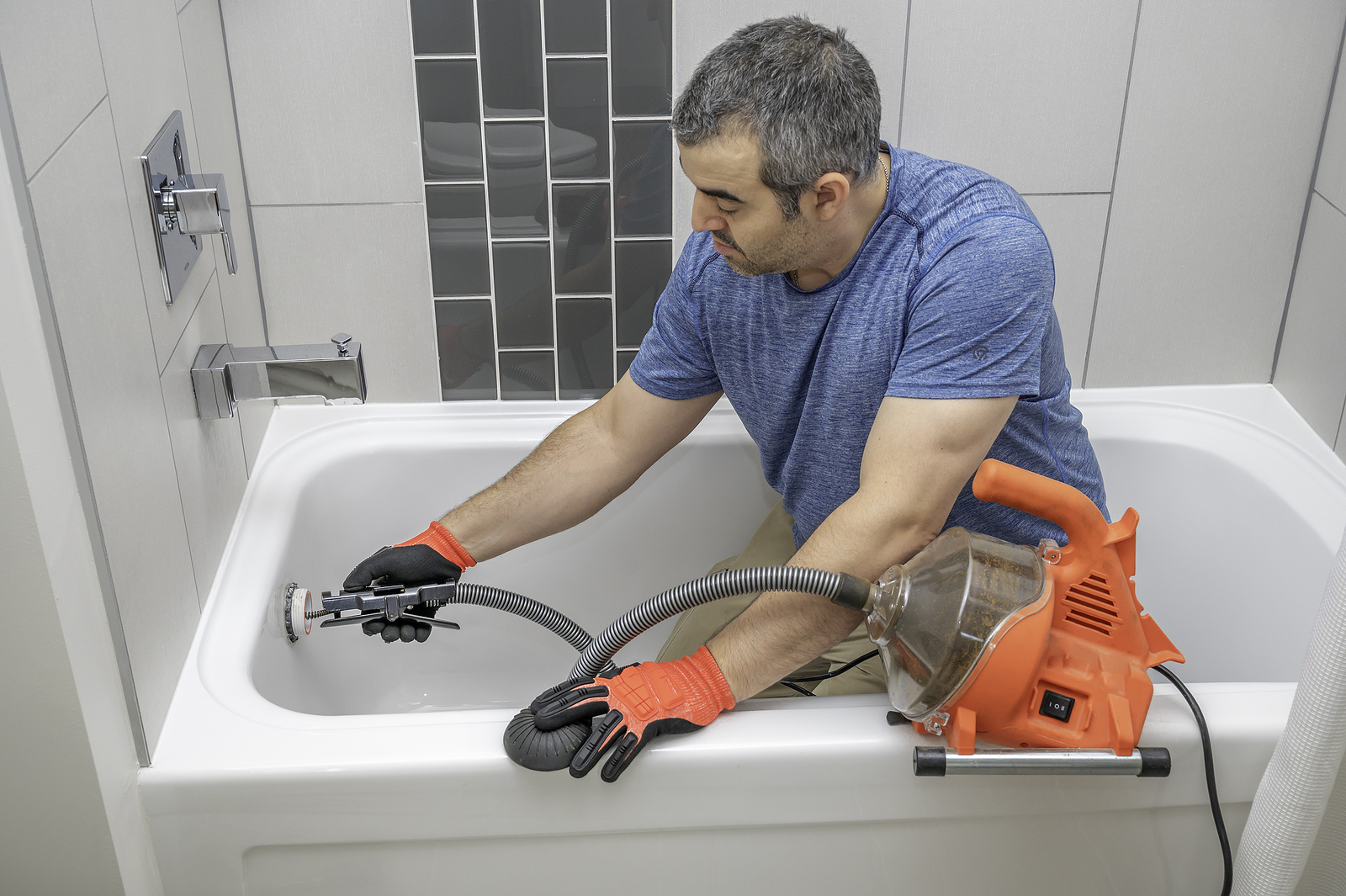 how-to-use-a-plumbing-snake-rooter-man-plumbers